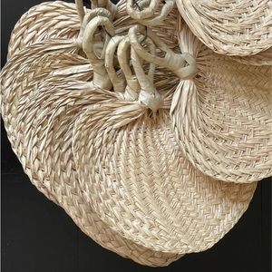 Lot of raffia hand fans